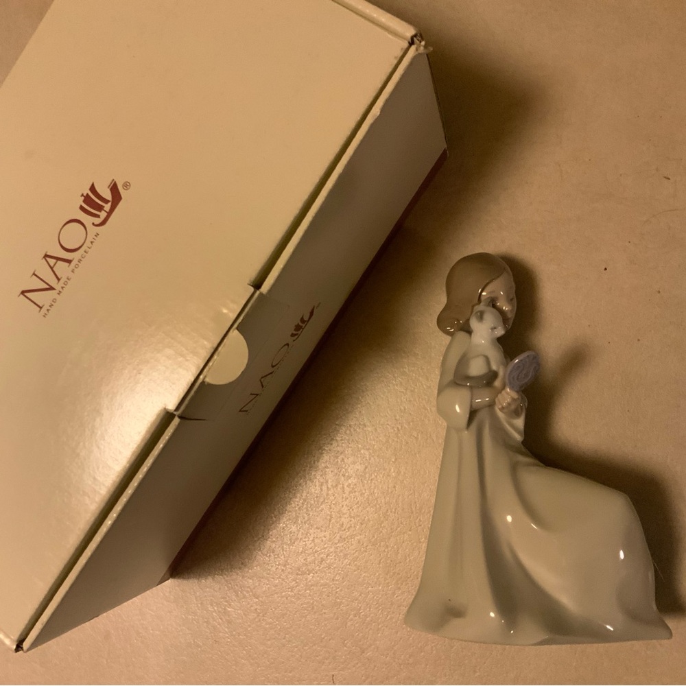 Porcelain Figurine with Flowing White Gown